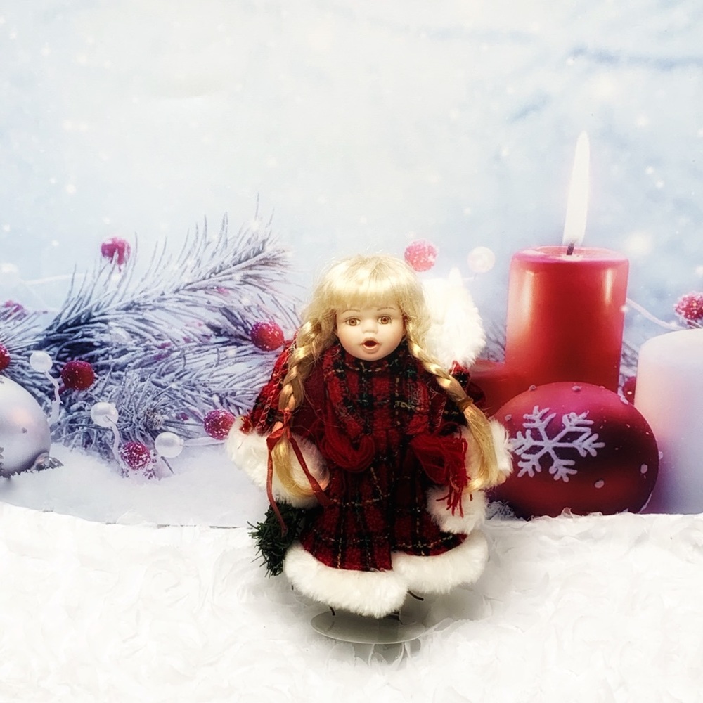 Vintage Christmas porcelain doll.